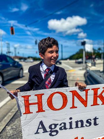 “God bless you son! Never become communist,” said a lady to a younger TFP volunteer.