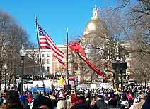 Over 3,000 attended the rally, which took place in front of the State House in downtown Boston.