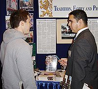 TFP member Cesar Franco talks to a student at CPAC 2005.