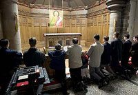 Venerating the relics of the Apostle St. Andrew, patron of Scotland.