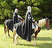 The "medieval games" were officiated by two "Knights of Malta" on horseback.