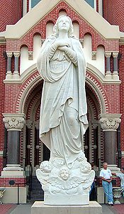 Four dozen souls made an act of reparation before a statue of Our Lady of the Assumption, Patroness of the Acadians