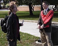 TFP Student Action member James Miller debates with a student.