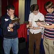 Young conservatives fill out TFP questionnaire at CPAC