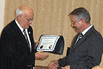 Colonel Paes de Lira receives a special medal from John Michael Snyder of Saint Gabriel Possenti Society