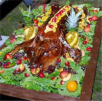 The highlight of this year's feast was a 100-pound pig, roasted over an open fire and richly decorated.<