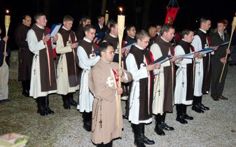 TFP choir members sing during the evening rosary procession.