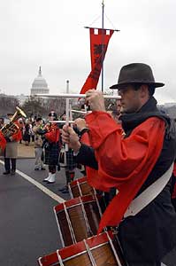 As in years past, the TFP's Holy Choirs of Angels marching band played a selection of patriotic hymns and American marches, to lift the spirits of marchers