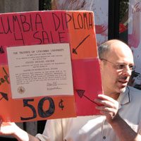 Columbia alumnus protesting in front of the main gate.