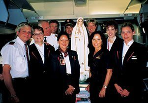 Thomas McKenna recently flew to Austria with the Pilgrim Virgin Statue of Our Lady of Fatima aboard a Northwest flight. The crew could not have been happier to receive such a grace.