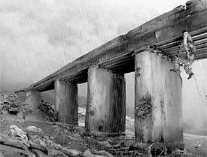 Capt. John W. Ripley under Dong Ha Bridge as he placed explosives