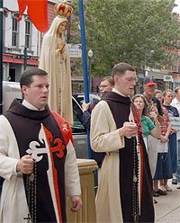 During the protest, TFP members wearing the TFP ceremonial habit stood as an honor guard in front of the statue of Our Lady of Fatima.