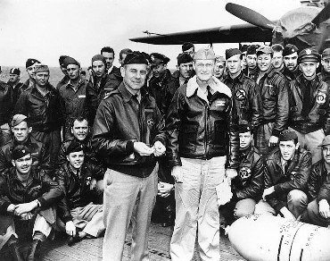 Lt. Col. Jimmy Doolittle with Capt. Mitscher and other Raiders aboard USS Hornet.jpg