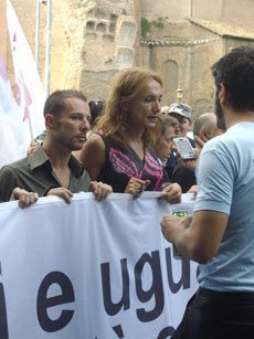 Mr. Luxuria (right), a known and avowed homosexual, received Holy Communion from the hands of a Cardinal at the Funeral Mass of Father Andrea Gallo.