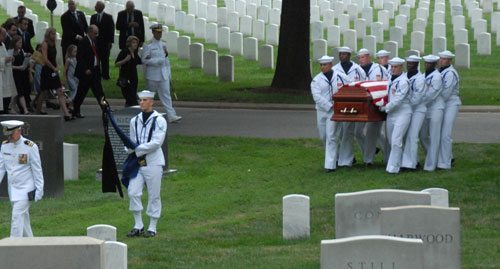 The Navy body bearers then took the coffin from the caisson and marched solemnly to the grave site