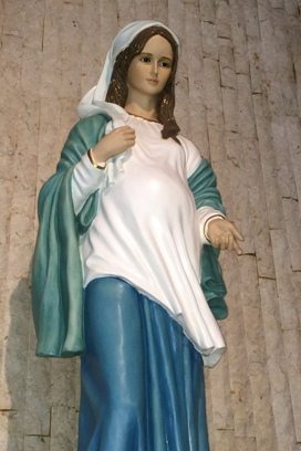 Worldly statue misrepresenting Our Lady with baby pump