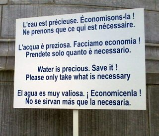 Save water sign in Lourdes.