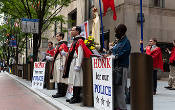 A Light in the Darkness: TFP Rosary Rally Illuminates New York City